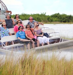 Guests on an airboat tour in the Everglades