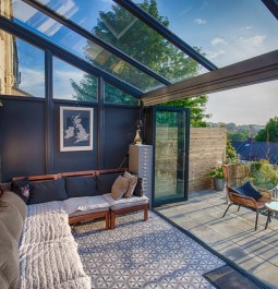 indoor and outdoor living space with large windows