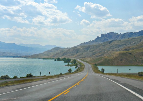 blue reservoir waters and mountain views