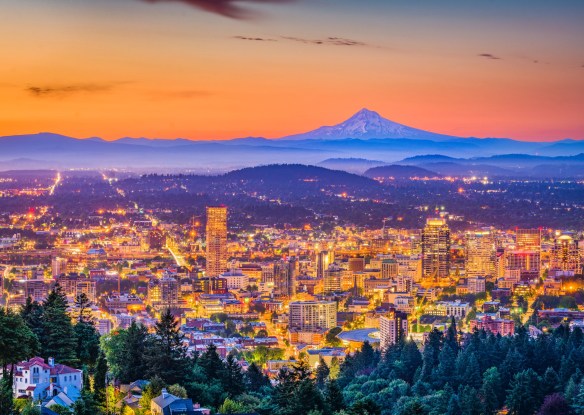 Portland, Oregon, USA downtown skyline with Mt. Hood at dawn.