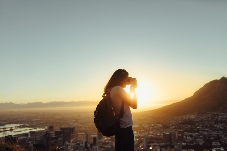 Solo traveler capturing the view