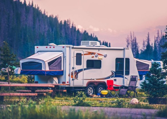 Camper with pop-outs and trees